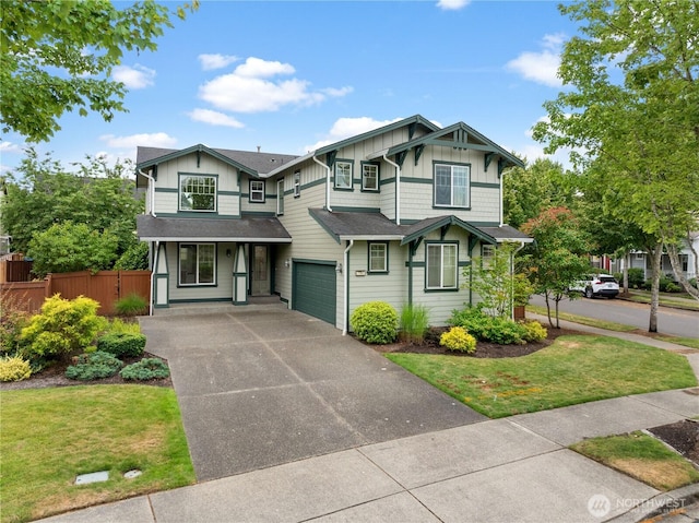 7701 Rushmore Ave NE, Lacey, WA 98516 - view of front facade with driveway, a garage, and board and batten siding
