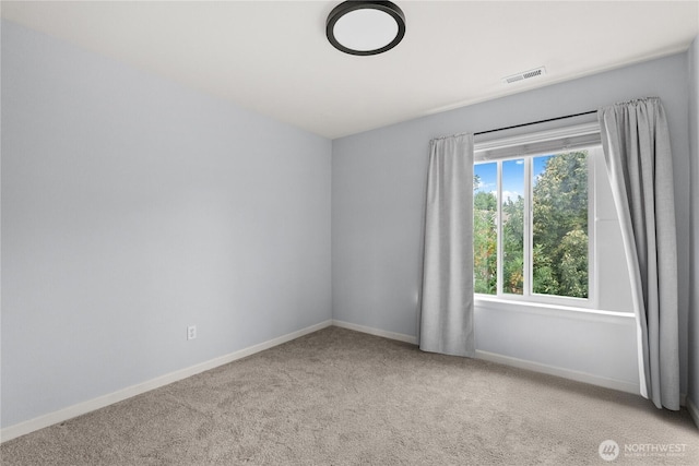 7701 Rushmore Ave NE, Lacey, WA 98516 - carpeted empty room featuring baseboards