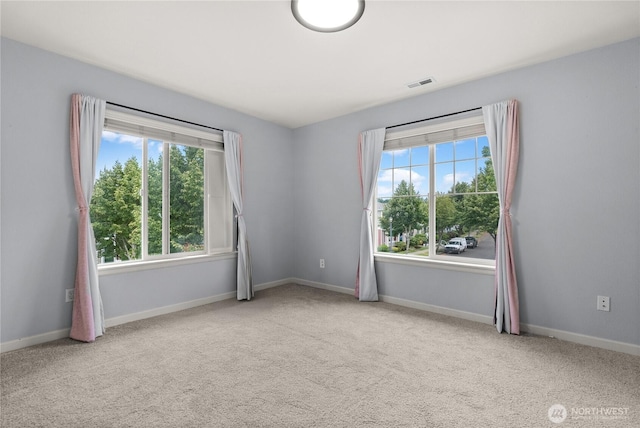 7701 Rushmore Ave NE, Lacey, WA 98516 - unfurnished room with carpet floors and baseboards
