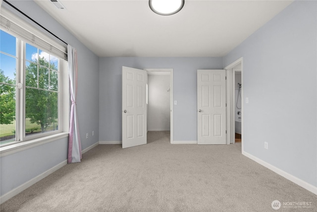 7701 Rushmore Ave NE, Lacey, WA 98516 - unfurnished bedroom with carpet flooring