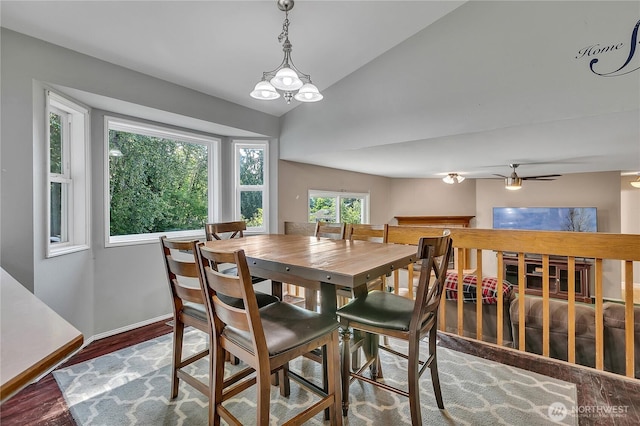 25128 168th Pl SE, Covington, WA 98042 - dining room featuring a ceiling fan, wood finished floors, and lofted ceiling