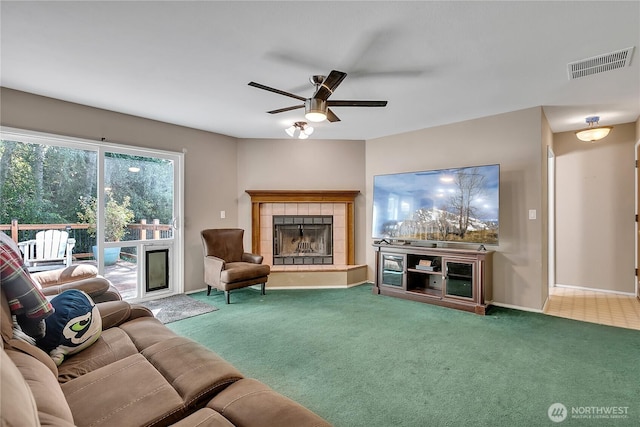 25128 168th Pl SE, Covington, WA 98042 - living area with ceiling fan, carpet flooring, and a tile fireplace