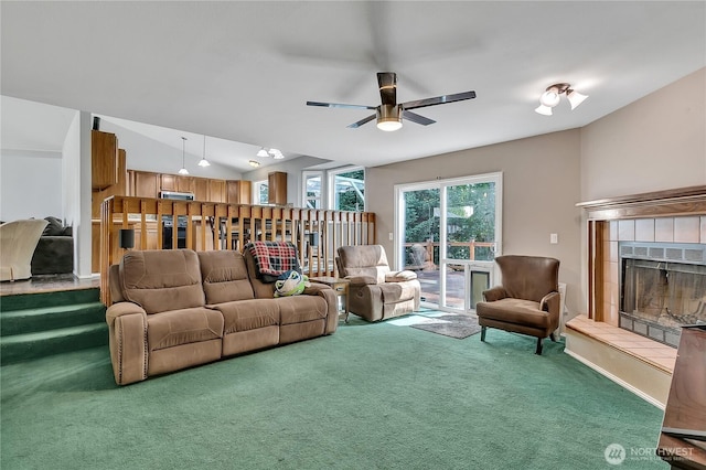 25128 168th Pl SE, Covington, WA 98042 - carpeted living area featuring a fireplace, ceiling fan, and vaulted ceiling