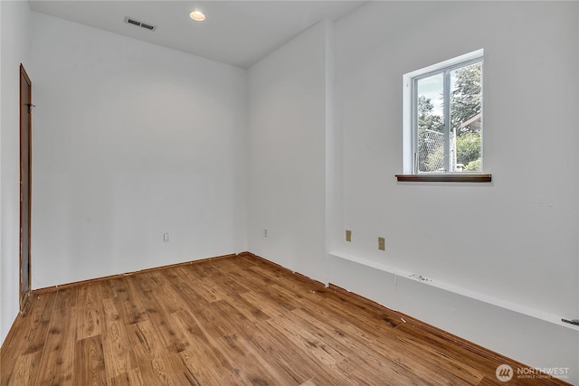 25128 168th Pl SE, Covington, WA 98042 - spare room with wood finished floors and recessed lighting
