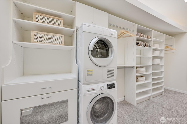 804 109th Ave SE, Bellevue, WA 98004 - laundry area with stacked washing machine and dryer and light carpet