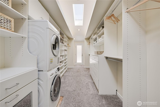 804 109th Ave SE, Bellevue, WA 98004 - laundry area featuring stacked washer / dryer and light colored carpet