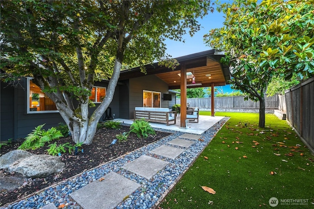 804 109th Ave SE, Bellevue, WA 98004 - fenced backyard featuring outdoor lounge area and a patio area