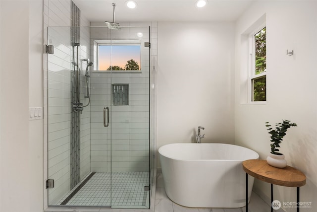 5404 26th Ave SW, Seattle, WA 98106 - full bathroom with a soaking tub, a shower stall, and recessed lighting