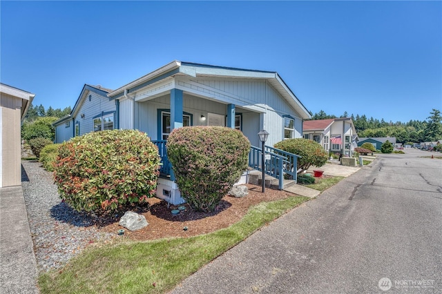 1915 140th St E Unit 193, Tacoma, WA 98445 - view of front of house featuring a porch