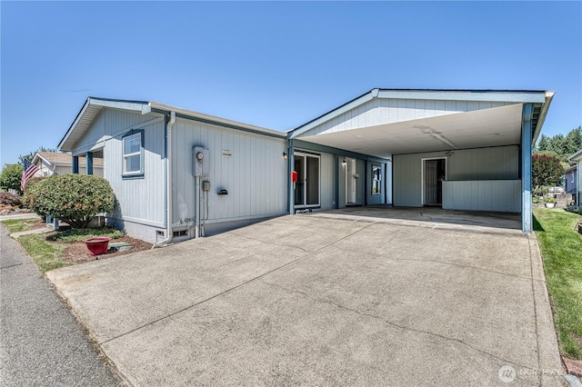 1915 140th St E Unit 193, Tacoma, WA 98445 - manufactured / mobile home featuring driveway and a carport