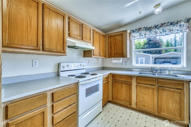 1915 140th St E Unit 193, Tacoma, WA 98445 - kitchen featuring white electric range oven, under cabinet range hood, light flooring, vaulted ceiling, and light countertops