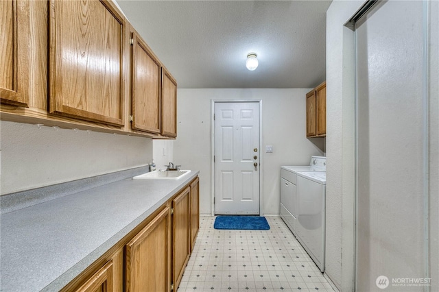 1915 140th St E Unit 193, Tacoma, WA 98445 - laundry area with washer and dryer, cabinet space, and light flooring