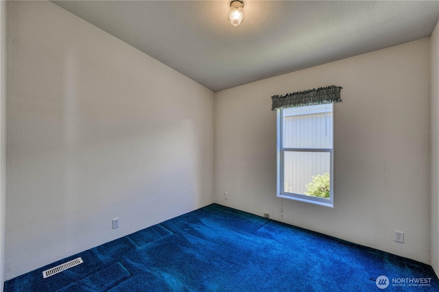 1915 140th St E Unit 193, Tacoma, WA 98445 - unfurnished room featuring dark carpet