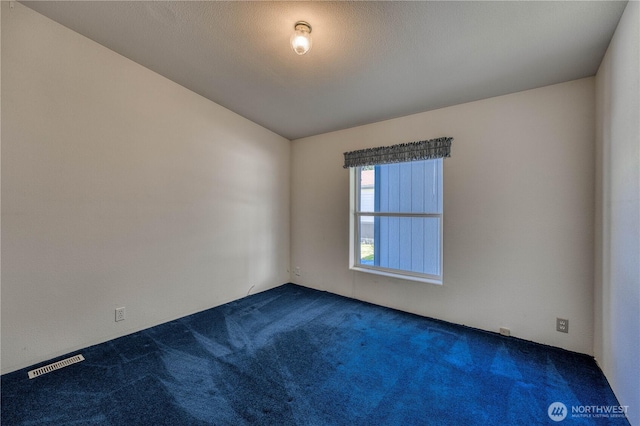 1915 140th St E Unit 193, Tacoma, WA 98445 - unfurnished room featuring dark colored carpet