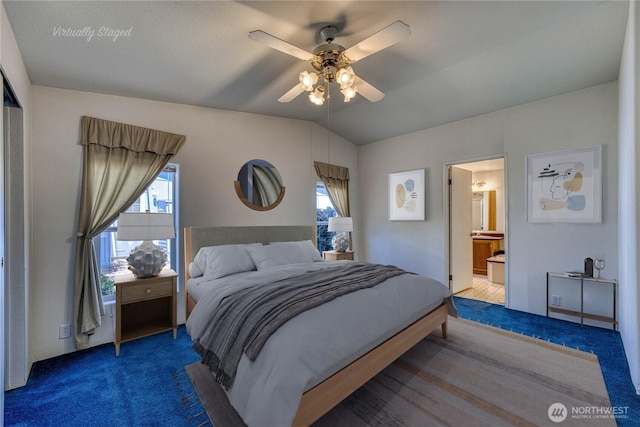 1915 140th St E Unit 193, Tacoma, WA 98445 - bedroom featuring carpet flooring, multiple windows, vaulted ceiling, ensuite bathroom, and a ceiling fan