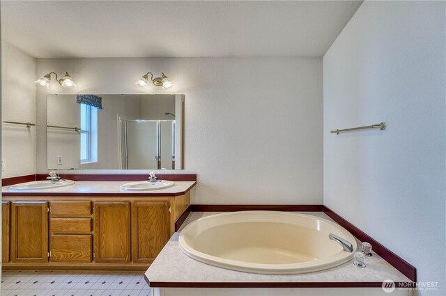 1915 140th St E Unit 193, Tacoma, WA 98445 - full bath with a garden tub, a shower stall, and double vanity