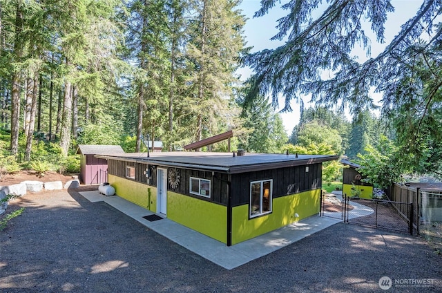 13285 Wye Lake Blvd SW, Port Orchard, WA 98367 - view of front of house with a gate