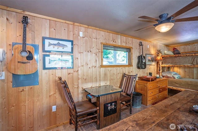 13285 Wye Lake Blvd SW, Port Orchard, WA 98367 - dining room with wooden walls and a ceiling fan