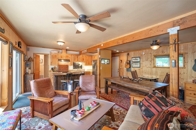13285 Wye Lake Blvd SW, Port Orchard, WA 98367 - living area with ceiling fan, wood walls, and light colored carpet