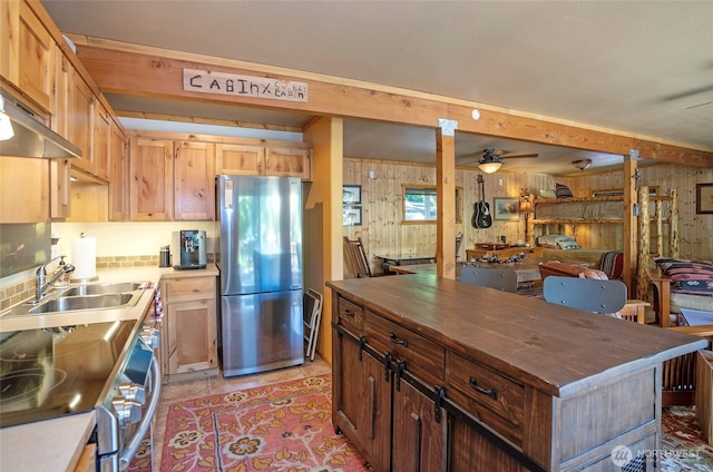 13285 Wye Lake Blvd SW, Port Orchard, WA 98367 - kitchen with stainless steel appliances, butcher block countertops, a ceiling fan, exhaust hood, and open floor plan