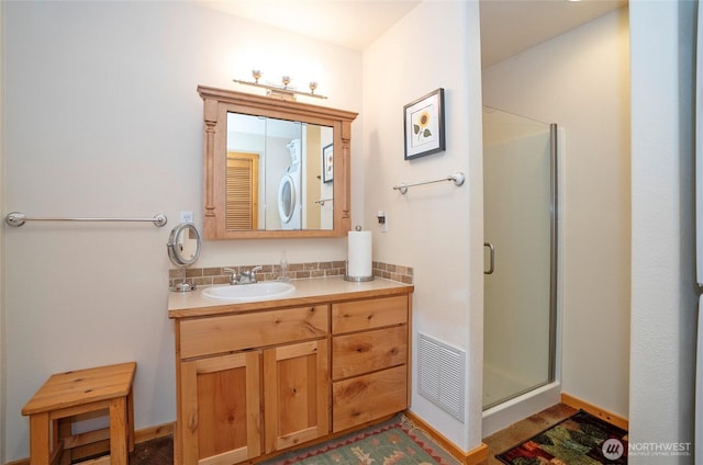 13285 Wye Lake Blvd SW, Port Orchard, WA 98367 - bathroom with vanity, tasteful backsplash, and a stall shower