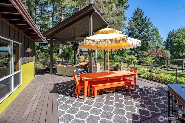 13285 Wye Lake Blvd SW, Port Orchard, WA 98367 - wooden terrace with a gazebo, outdoor lounge area, outdoor dining space, and view of wooded area