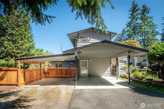 11627 NE 75th St, Kirkland, WA 98033 - view of front of house featuring asphalt driveway and an attached carport