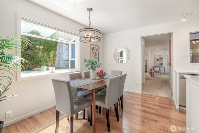 11627 NE 75th St, Kirkland, WA 98033 - dining room featuring light wood-style floors, a chandelier, and track lighting