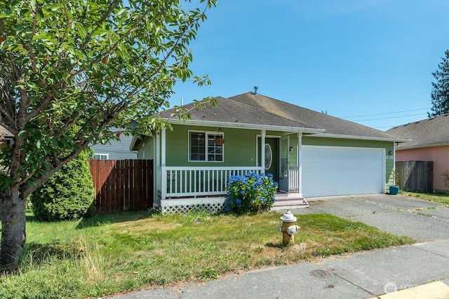 405 Spring Ln, Sedro Woolley, WA 98284 - view of front of property with asphalt driveway, an attached garage, a porch, and a shingled roof