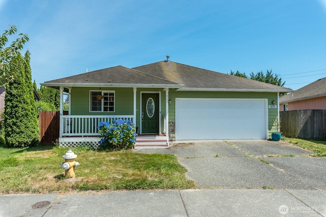 405 Spring Ln, Sedro Woolley, WA 98284 - view of front facade featuring driveway, covered porch, a garage, and a shingled roof