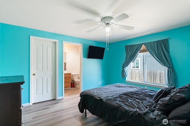 405 Spring Ln, Sedro Woolley, WA 98284 - bedroom featuring wood finished floors, a ceiling fan, and connected bathroom