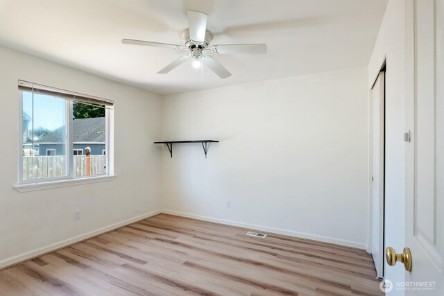 405 Spring Ln, Sedro Woolley, WA 98284 - spare room with light wood-type flooring and a ceiling fan