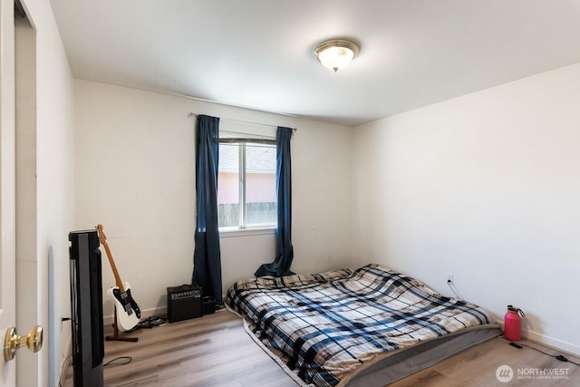 405 Spring Ln, Sedro Woolley, WA 98284 - bedroom with light wood-type flooring and baseboards