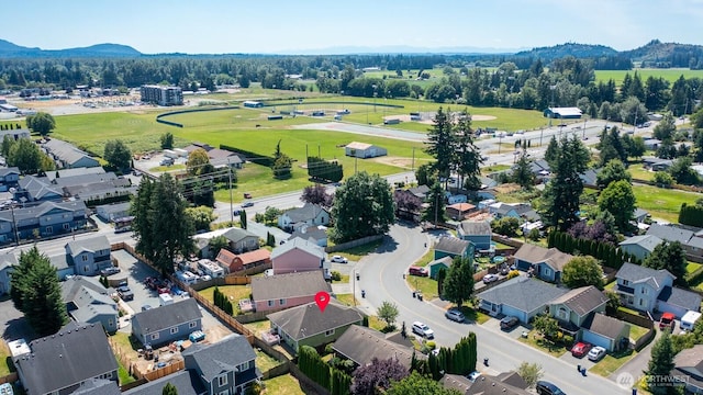 405 Spring Ln, Sedro Woolley, WA 98284 - aerial view of residential area with a mountain backdrop