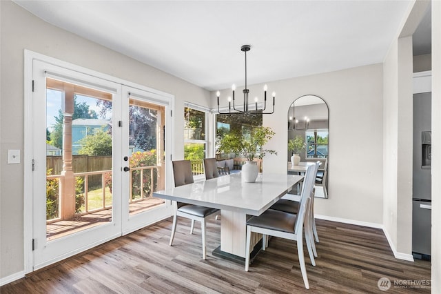 1617 SW 324th Pl, Federal Way, WA 98023 - dining room with a chandelier, dark wood-type flooring, and plenty of natural light