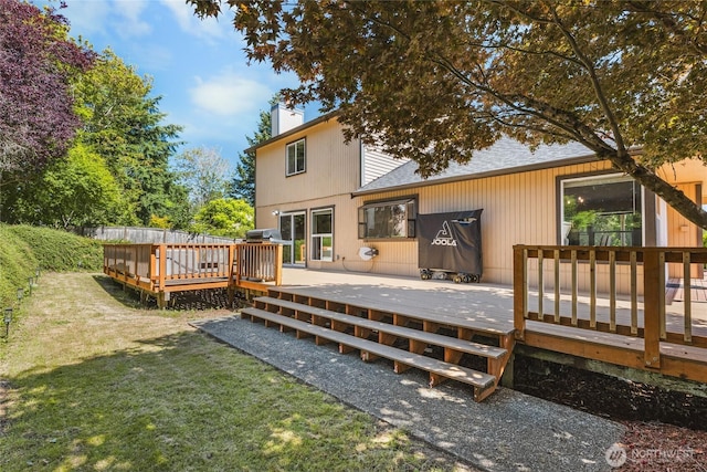 1617 SW 324th Pl, Federal Way, WA 98023 - back of house featuring a chimney, a shingled roof, a lawn, and a deck