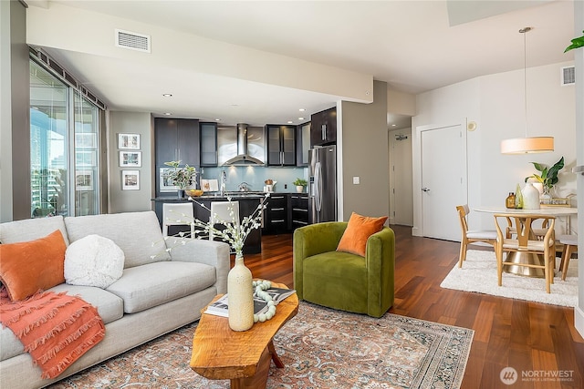 2121 Terry Ave Unit 1402, Seattle, WA 98121 - living room with dark wood-style flooring