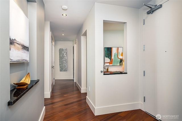 2121 Terry Ave Unit 1402, Seattle, WA 98121 - corridor with wood finished floors and recessed lighting