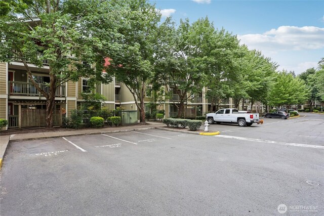 7711 NE 175th St Unit E110, Kenmore, WA 98028 - view of uncovered parking lot