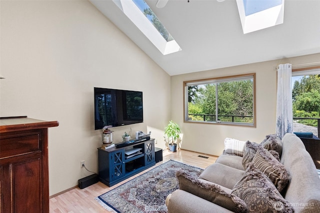 2815 60th Street Ct NW, Gig Harbor, WA 98335 - living area featuring a skylight, light wood-style flooring, and lofted ceiling
