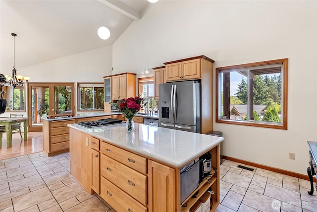2815 60th Street Ct NW, Gig Harbor, WA 98335 - kitchen featuring stainless steel appliances, high vaulted ceiling, a chandelier, light tile patterned floors, and light countertops
