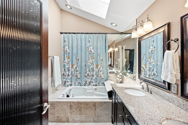 2815 60th Street Ct NW, Gig Harbor, WA 98335 - bathroom featuring a skylight, a relaxing tiled tub, double vanity, lofted ceiling, and recessed lighting