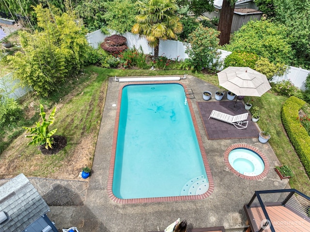 2815 60th Street Ct NW, Gig Harbor, WA 98335 - view of swimming pool featuring an in-ground hot tub and a fenced backyard