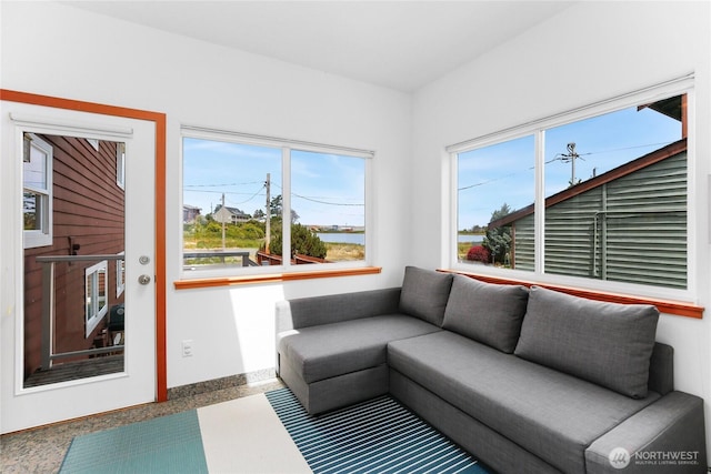 451 Beach Dr, Sequim, WA 98382 - living room featuring speckled floor and baseboards