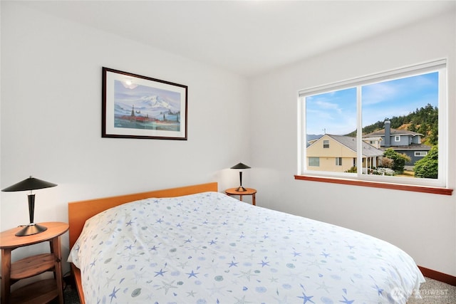 451 Beach Dr, Sequim, WA 98382 - carpeted bedroom featuring baseboards