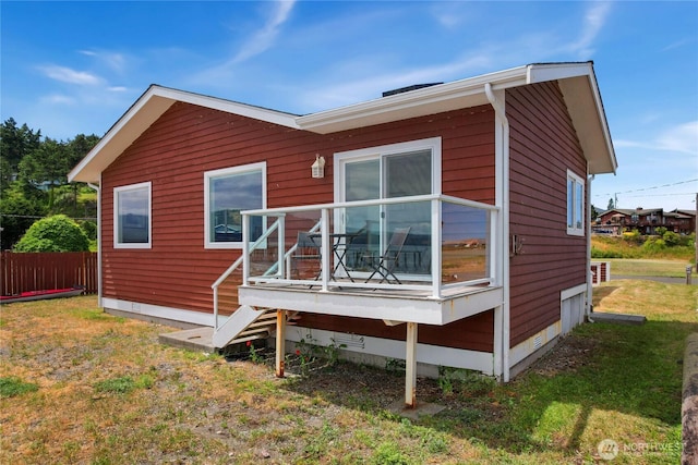 451 Beach Dr, Sequim, WA 98382 - rear view of house featuring a wooden deck and crawl space