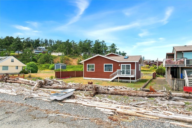 451 Beach Dr, Sequim, WA 98382 - view of front of house with a wooden deck