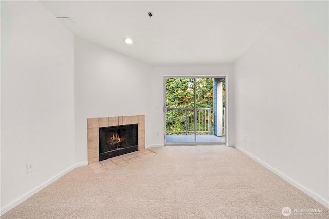 975 Aberdeen Ave NE Unit C306, Renton, WA 98056 - unfurnished living room featuring carpet, a tile fireplace, and recessed lighting
