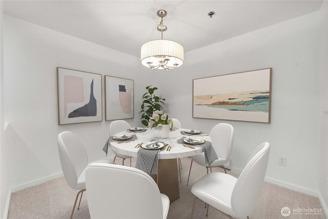 975 Aberdeen Ave NE Unit C306, Renton, WA 98056 - carpeted dining room featuring baseboards and a chandelier