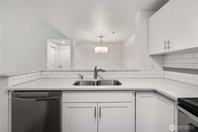 975 Aberdeen Ave NE Unit C306, Renton, WA 98056 - kitchen featuring dishwasher, decorative backsplash, light countertops, white cabinets, and hanging light fixtures
